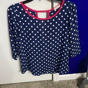 Very cute navy and white polka dot top trimmed in hot pink